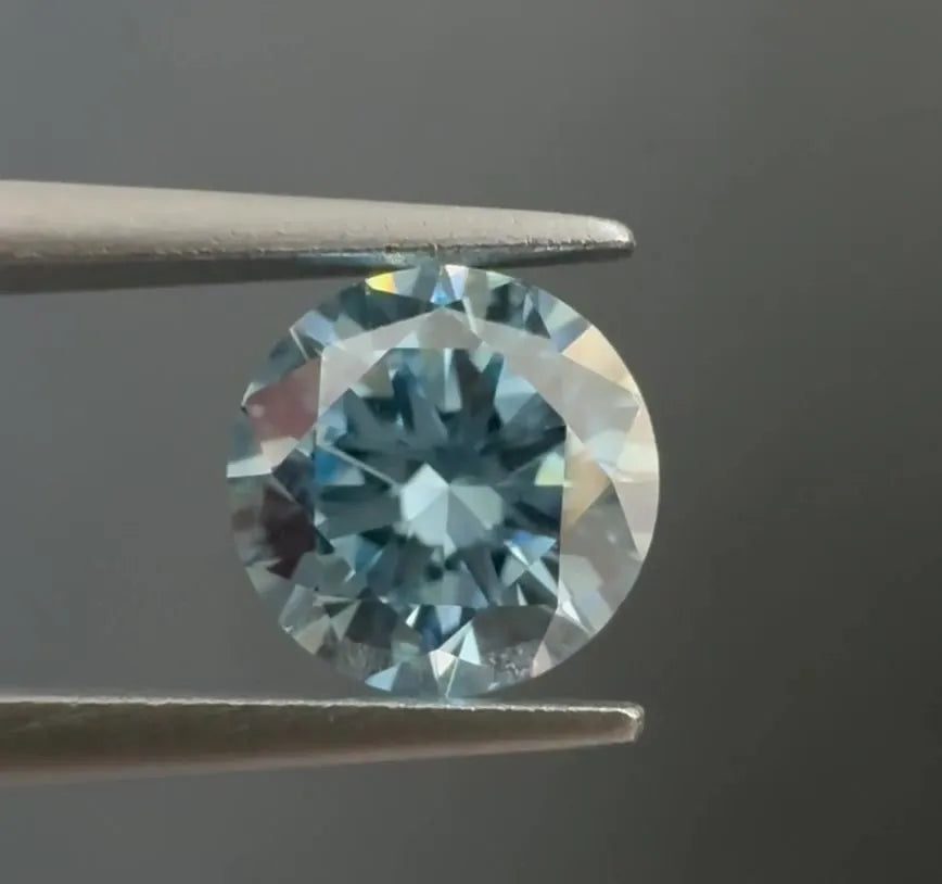 0.58ct Round Natural Diamond (Colour Fancy Intense Blue, Clarity VVS2, Cut EX, IGI Certified)