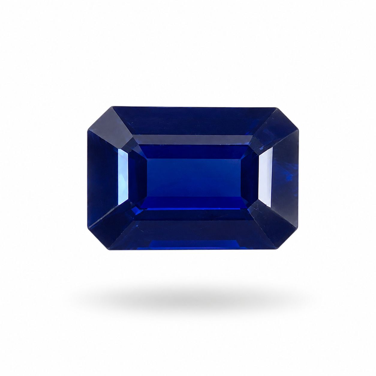 0.60 Carat Emerald Cut Blue Sapphire